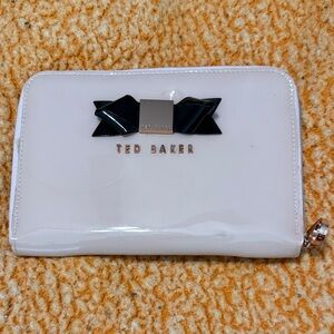Ted Baker White Patent Tech Case with Black Bow Accent